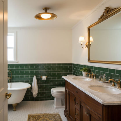Gilded iron ceiling light in a green-tiled bathroom — Casa Norex