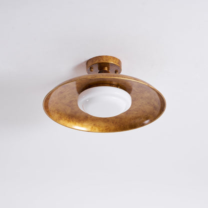 Gilded iron flush mount seen from below at an angle — Casa Norex