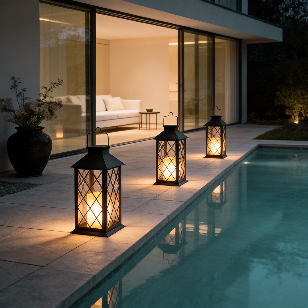 Wicklow lantern by a modern pool with warm glow — Casa Norex