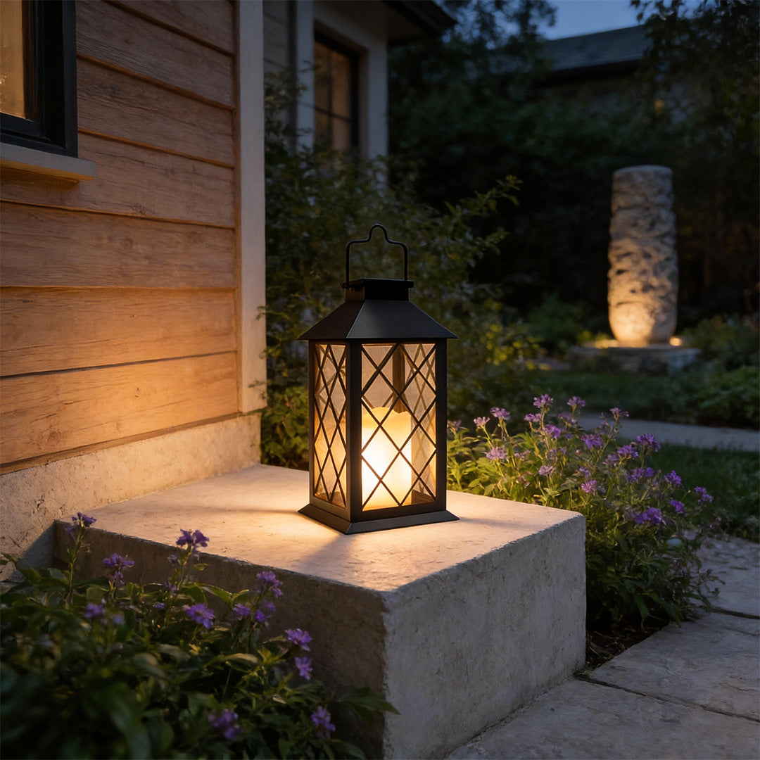 Wicklow lantern on a garden pathway at night — Casa Norex