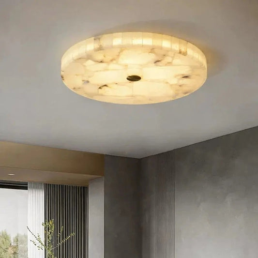 Round alabaster flush mount ceiling light — natural stone silhouette | Casa Norex