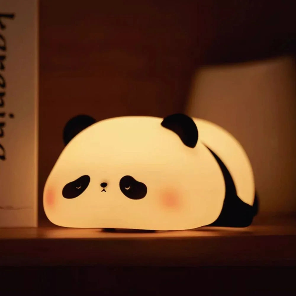 Sleepy Panda silicone night light glowing on a dark table — Casa Norex