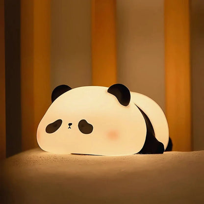Sleepy Panda night light on a shelf beside a lamp — Casa Norex