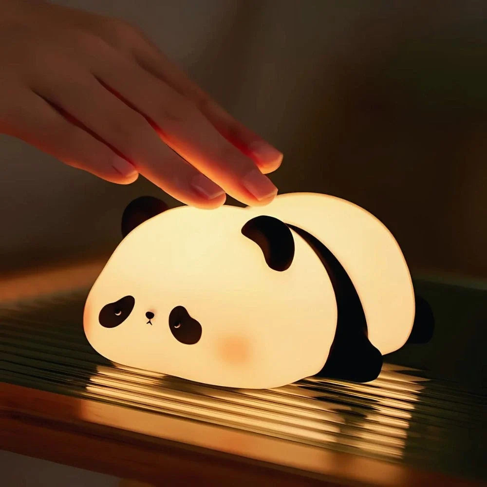 Hand tapping a Sleepy Panda night light — Casa Norex