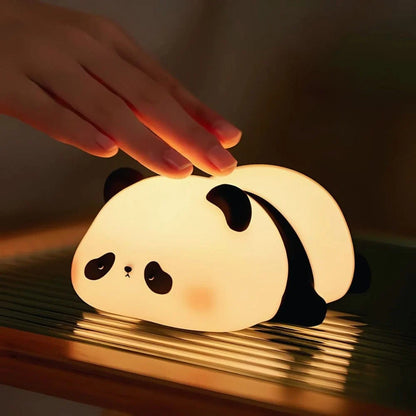 Hand tapping a Sleepy Panda night light — Casa Norex