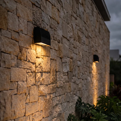 Quill spot light on a stone wall | Casa Norex