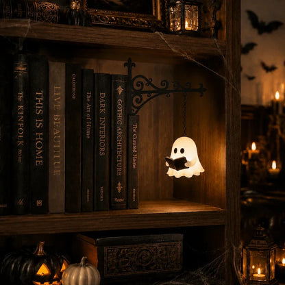 Folio bookshelf pendant light with a ghost reading a book hanging beside dark book spines | Casa Norex