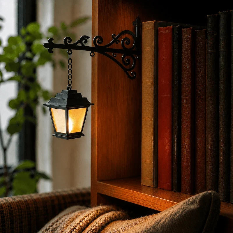 Cottage lantern pendant glowing warm white from a scrolled iron bracket by a reading chair — Casa Norex