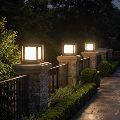 Plinth pedestal lights on stone columns along a walkway — Casa Norex