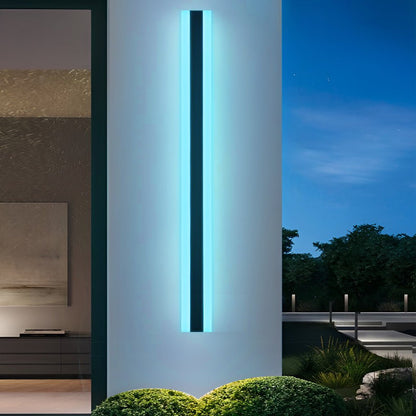 Linear LED wall light illuminating a home entryway — Casa Norex