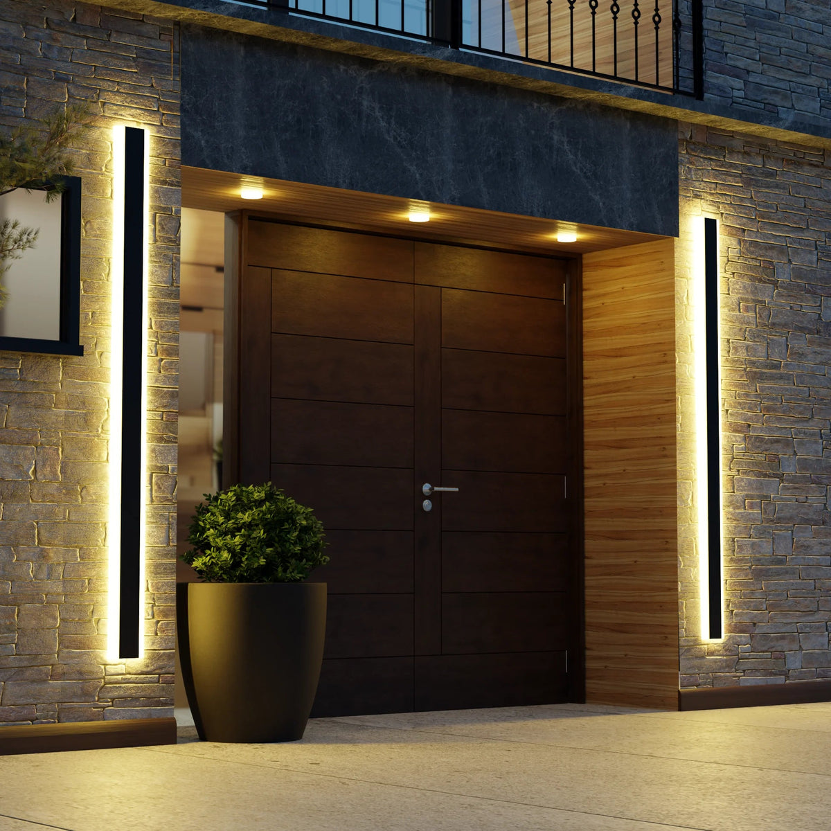 LED outdoor wall light mounted at an exterior gate — Casa Norex