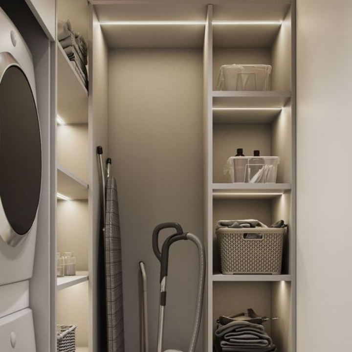 Light bars lighting a wardrobe and shelving in a laundry closet — Casa Norex