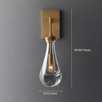 Raindrop wall sconce satin nickel finish lit glow — Casa Norex