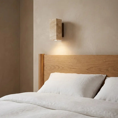 Travertine-style stone-look LED wall sconce — round shade with brushed metal arm | Casa Norex