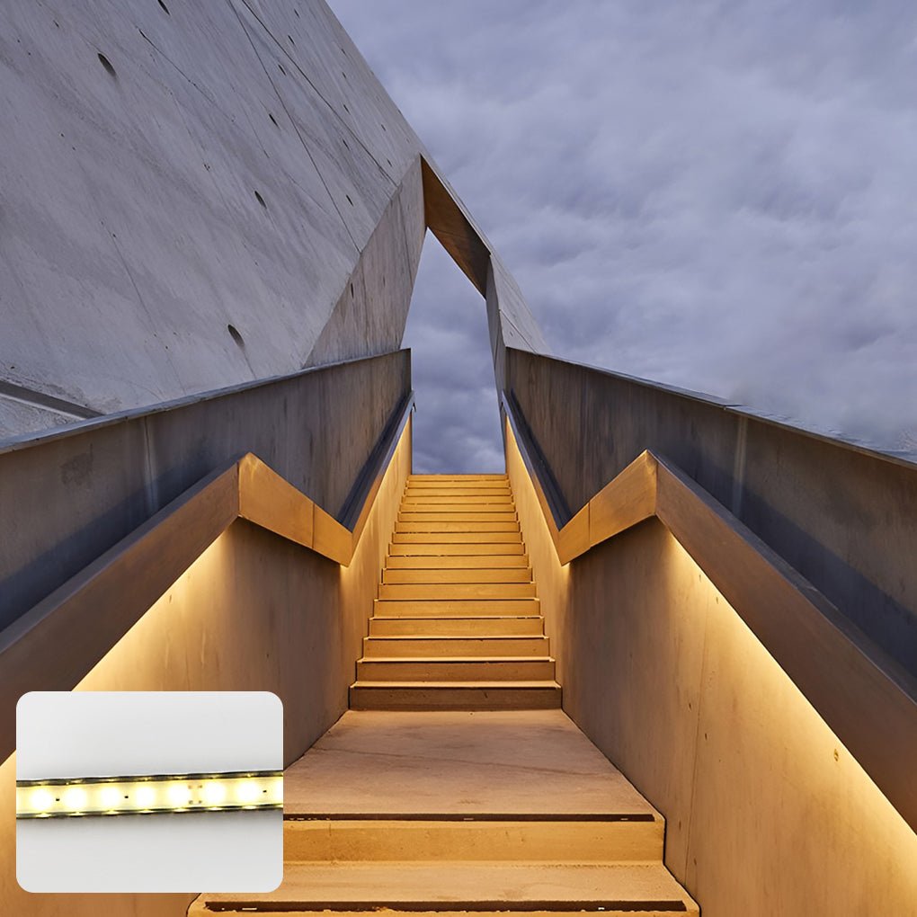 Sable linear step light lit along a staircase at night | Casa Norex