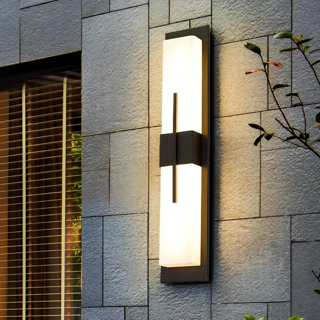 Tall rectangular outdoor wall light on gray stone wall — acrylic shade | Casa Norex