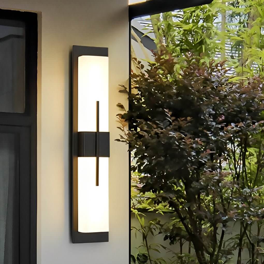 Tall rectangular outdoor wall light — stainless steel frame with acrylic shade on building facade | Casa Norex