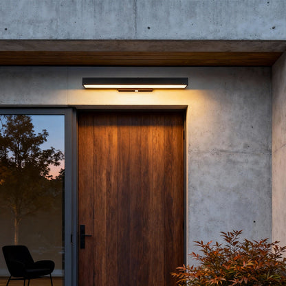 Tarver wall light above a wooden front door | Casa Norex