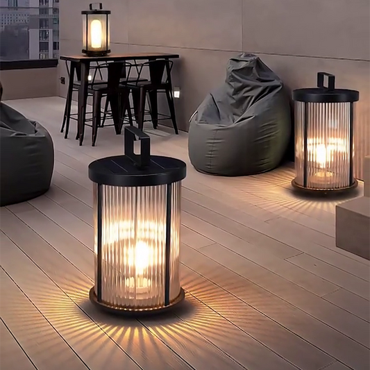 Corvina lantern on a wooden deck with modern furniture | Casa Norex