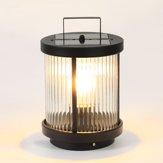 Striped glass outdoor lantern Corvina, solar lantern on a lawn by outdoor seating | Casa Norex