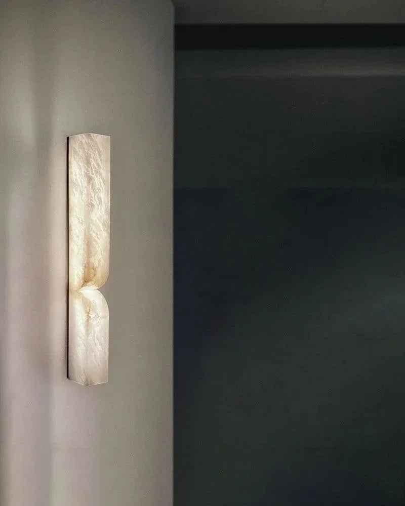 Geometric relief wall sconce detail — Casa Norex