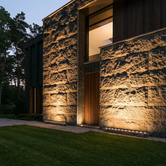 Skyline light grazing a textured exterior wall — Casa Norex