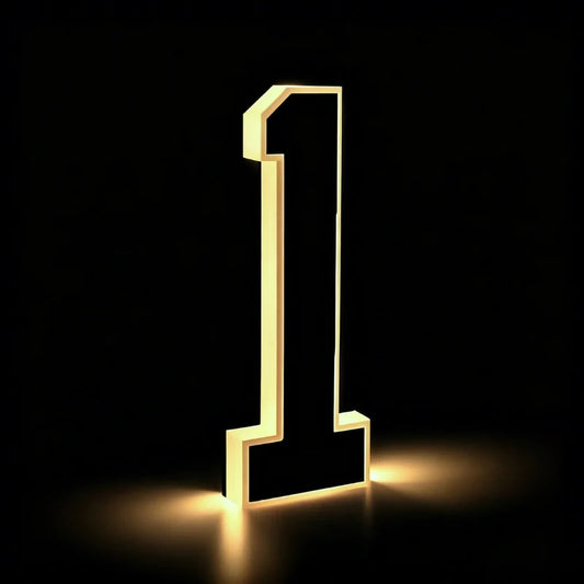 Solar house number light in matte black showing the digit 1 with a warm white glow | Casa Norex