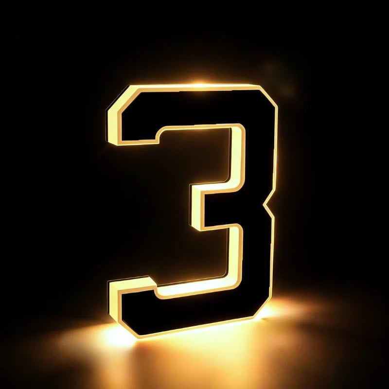 Illuminated number 3 with a warm white edge glow on a dark background | Casa Norex