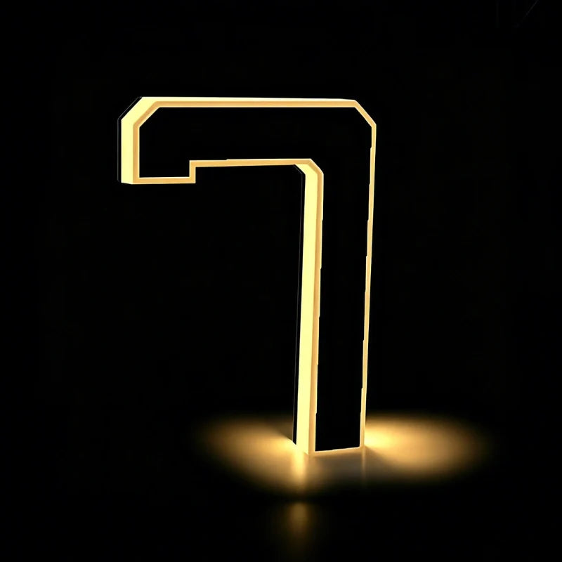 Illuminated number 7 outlined in warm white light — Casa Norex