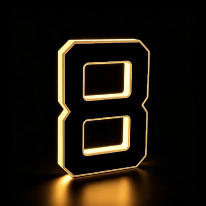 Illuminated number 8 in matte black with a warm white glow — Casa Norex