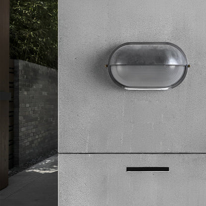 Bulkhead outdoor wall light minimalist oval shape — Casa Norex
