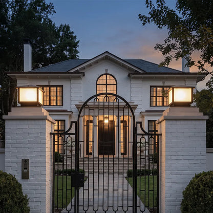 Brindle pillar lights at a luxury home entrance — Casa Norex
