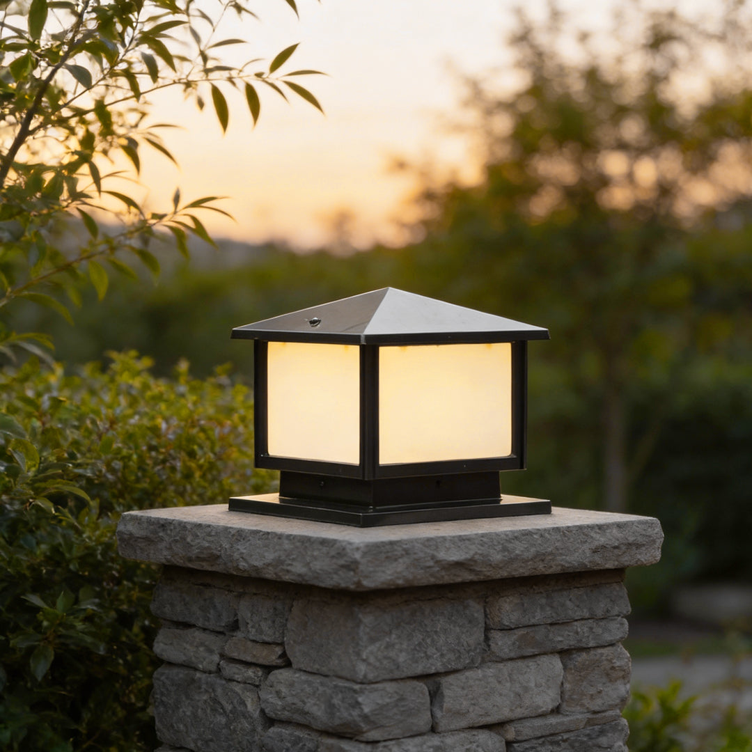 Brindle pillar light on a stone garden column — Casa Norex