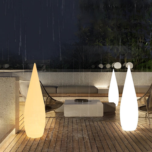 Teardrop outdoor floor lamp Tarn, modern teardrop light on a garden pathway | Casa Norex