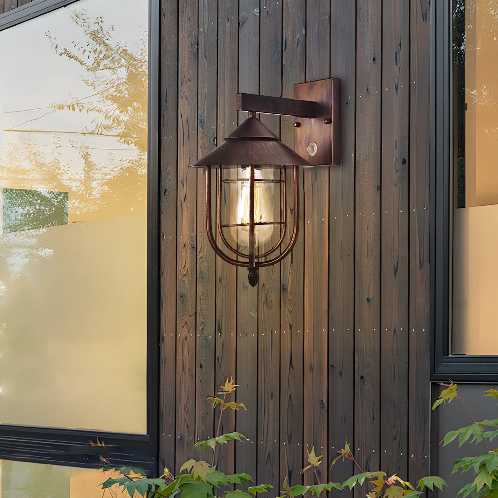 Lantern outdoor wall light on wood siding — Casa Norex