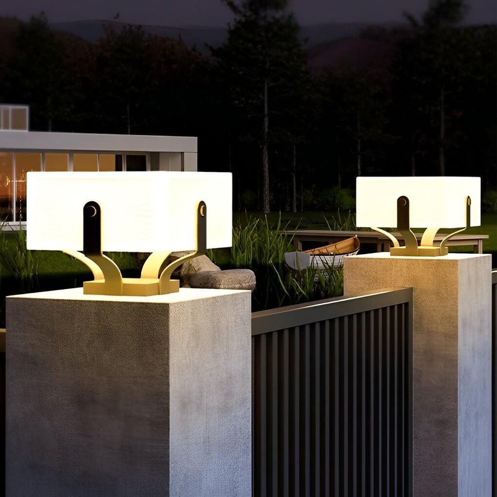 Plinth square outdoor pillar light beside a water feature