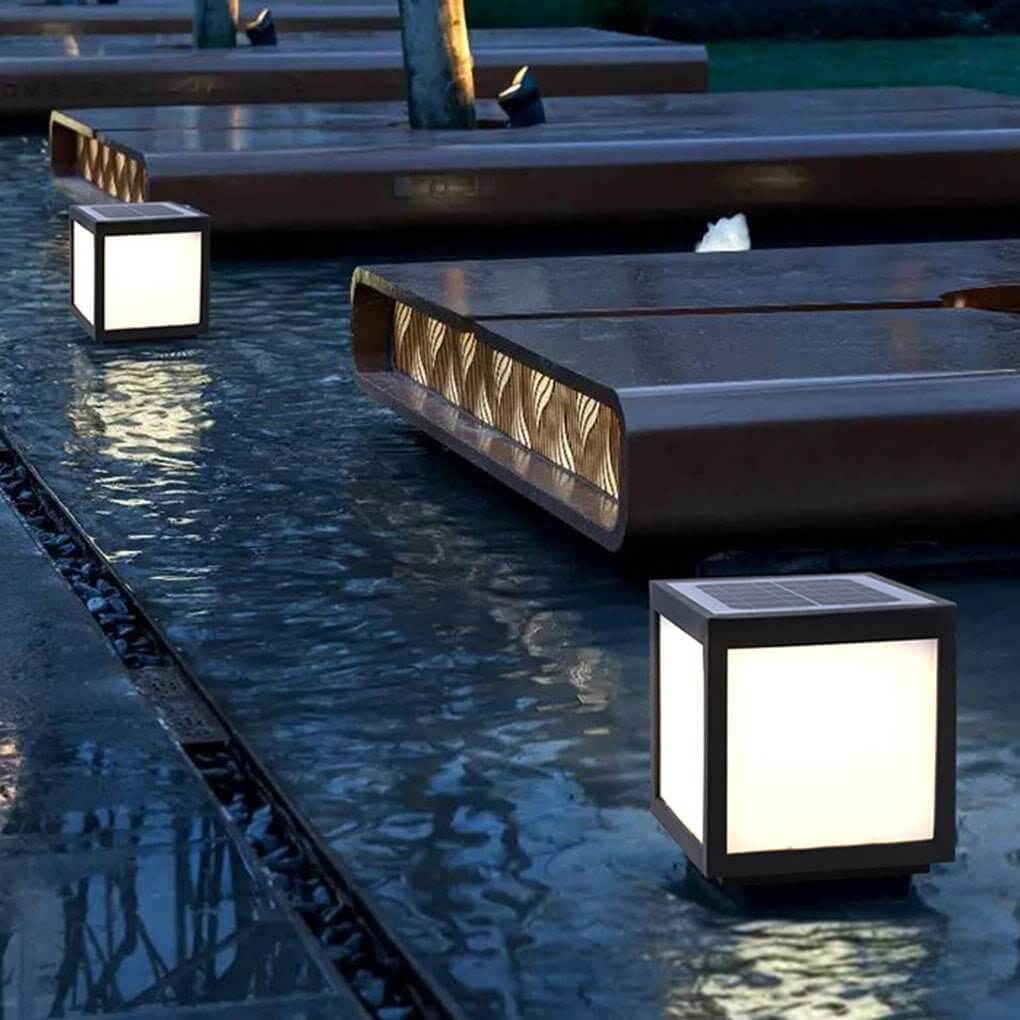 Garrick white PC panel pillar light in a garden | Casa Norex
