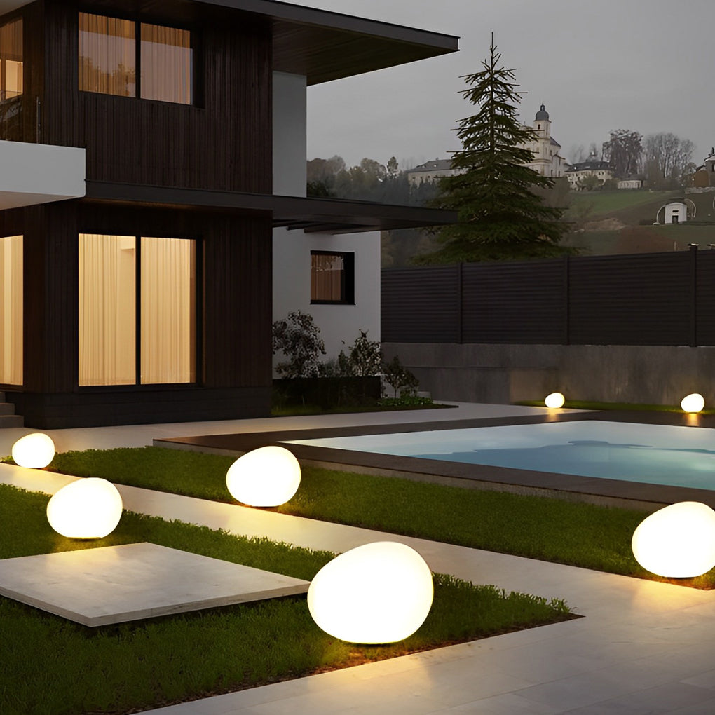 Cobble garden steps with soft light — Casa Norex