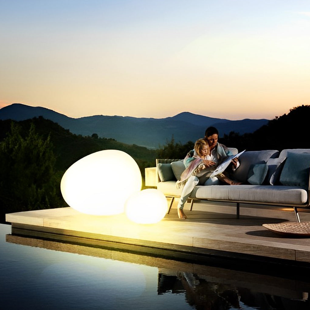 Cobble pebble lights with a sunset in the background | Casa Norex
