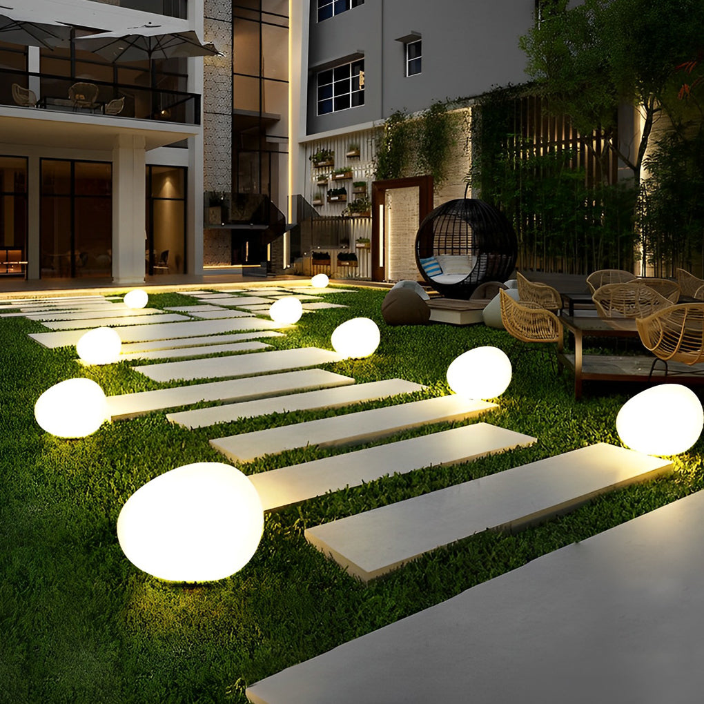 Pebble landscape lights Cobble, pebble lights by a pool and modern outdoor seating | Casa Norex