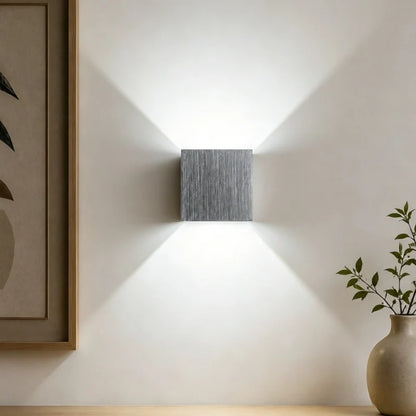Brushed silver cube wall light with cool white light — Casa Norex