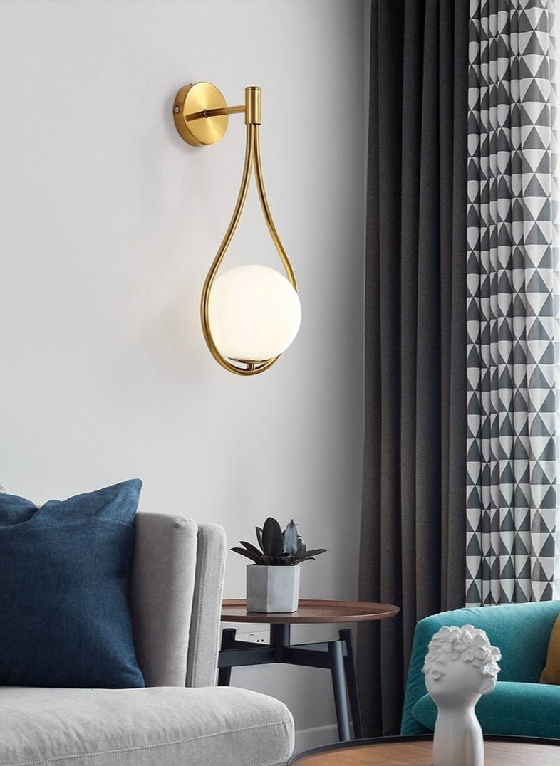 Nordic sconce in hallway - understated brass elegance - Casa Norex