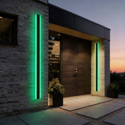 RGB linear outdoor wall light — vibrant color glow beside a modern house entrance | Casa Norex