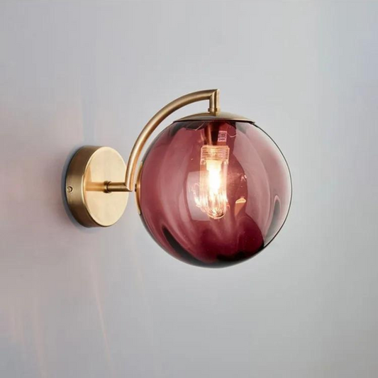 Howard textured glass globe wall sconce brass arm | Casa Norex