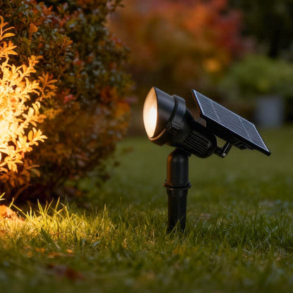 Adjustable solar spot lights adding ambiance to garden shrubs — Casa Norex