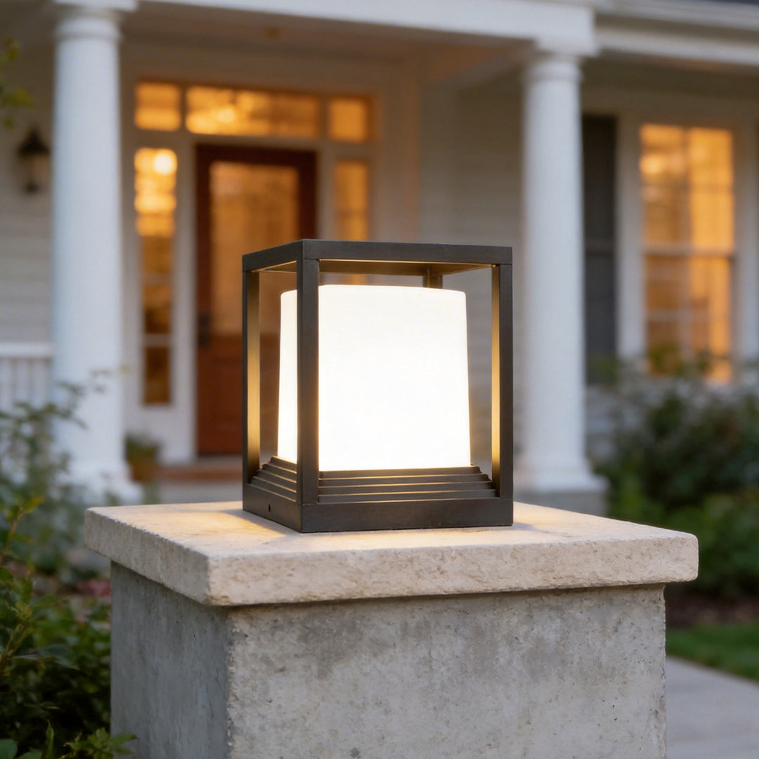 Plinth square black light on a concrete pillar by day — Casa Norex