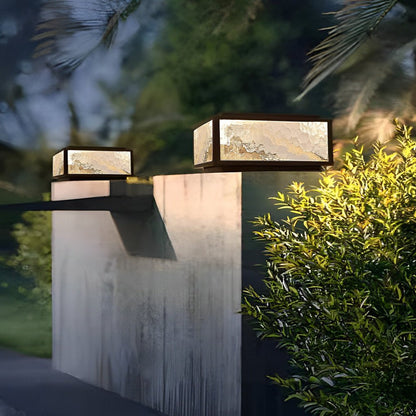 Merrin pillar light on a concrete column in a garden — Casa Norex