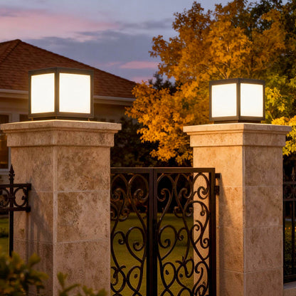 Garrick pillar lights on stone columns at a gated entrance — Casa Norex