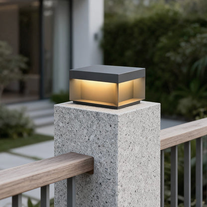 Forge post light on a concrete fence post — Casa Norex