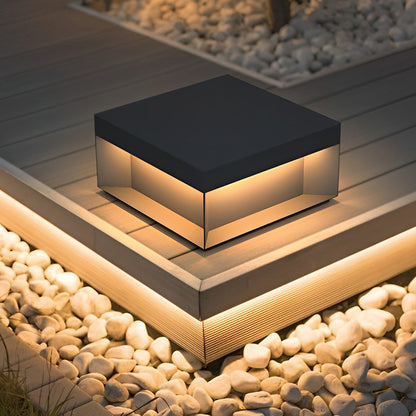 Forge post light on a wood deck corner | Casa Norex